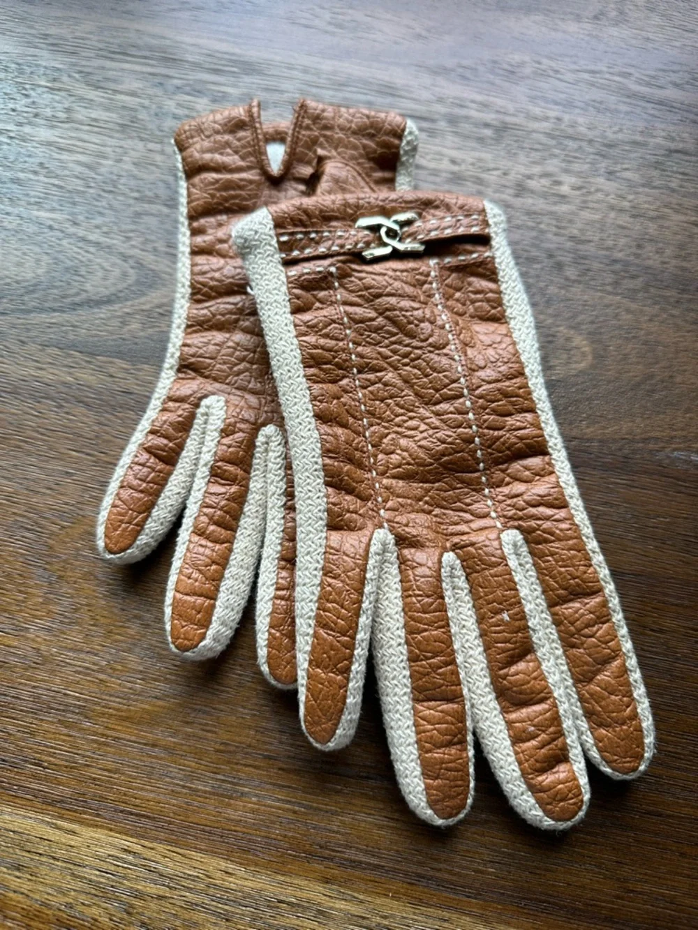 vintage Aris Novakid leather gloves featuring a gold buckle accent